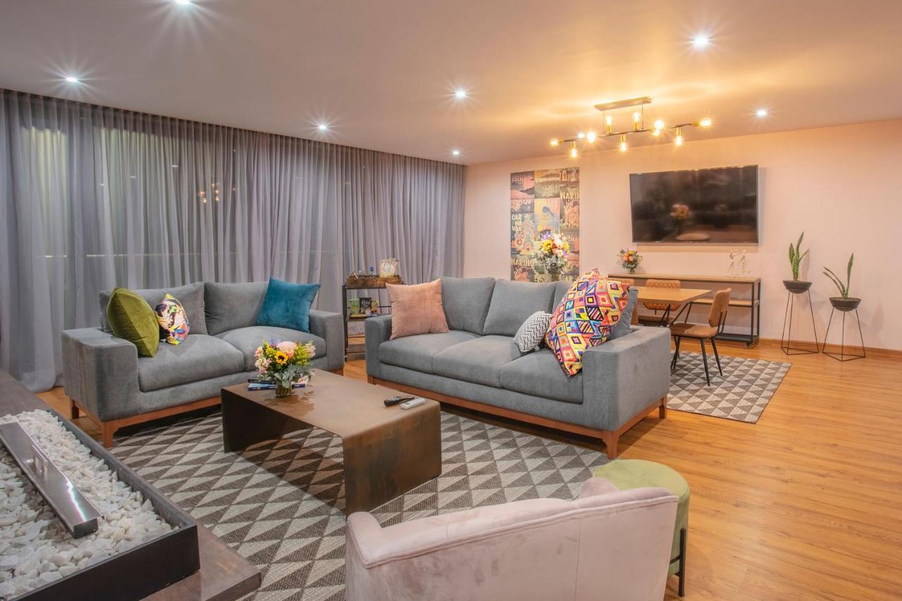Hotel V1501 Pasto Eksteriør billede The living room of the 2019 series